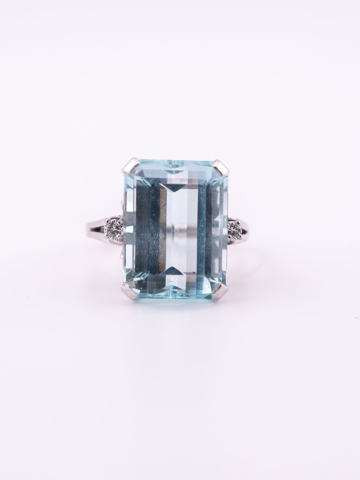 Ocean's Crown estate ring with 11.89 carat emerald cut aquamarine in 14K white gold