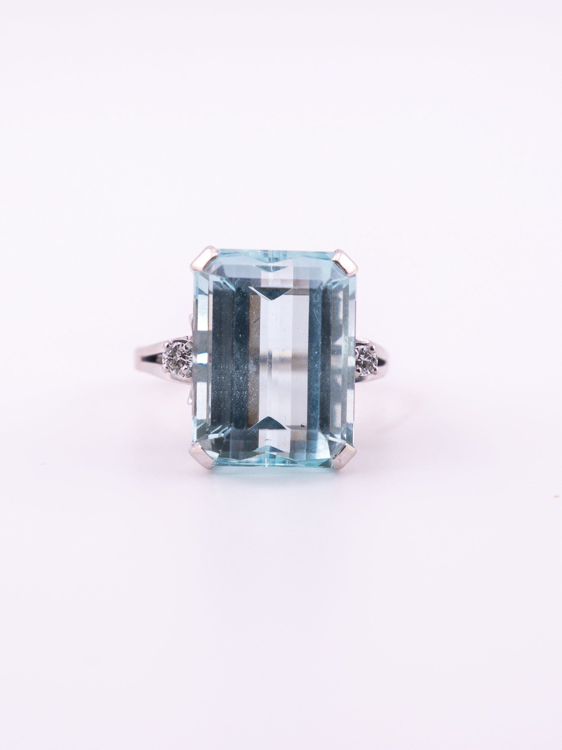 Ocean's Crown estate ring with 11.89 carat emerald cut aquamarine in 14K white gold